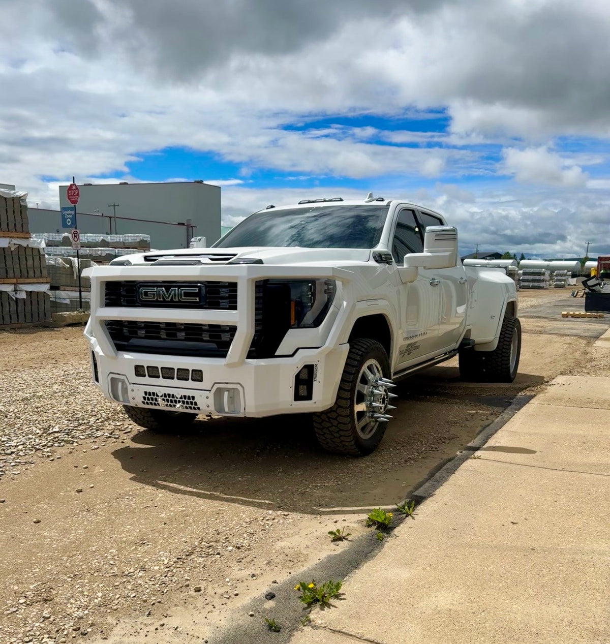 Maverick Grill Guard front bumper on a 2024+ GMC Sierra HD dually, shown in a custom white colour (ships in black powder coat)
