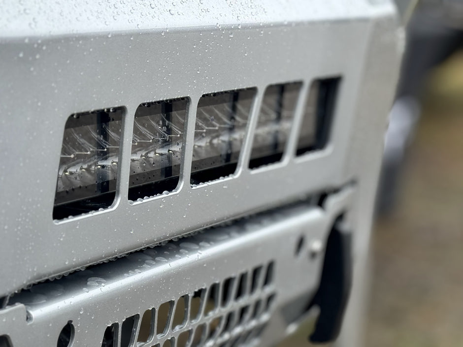 Maverick front bumper fog light pods close-up, shown in a custom colour (ships in black powder coat)