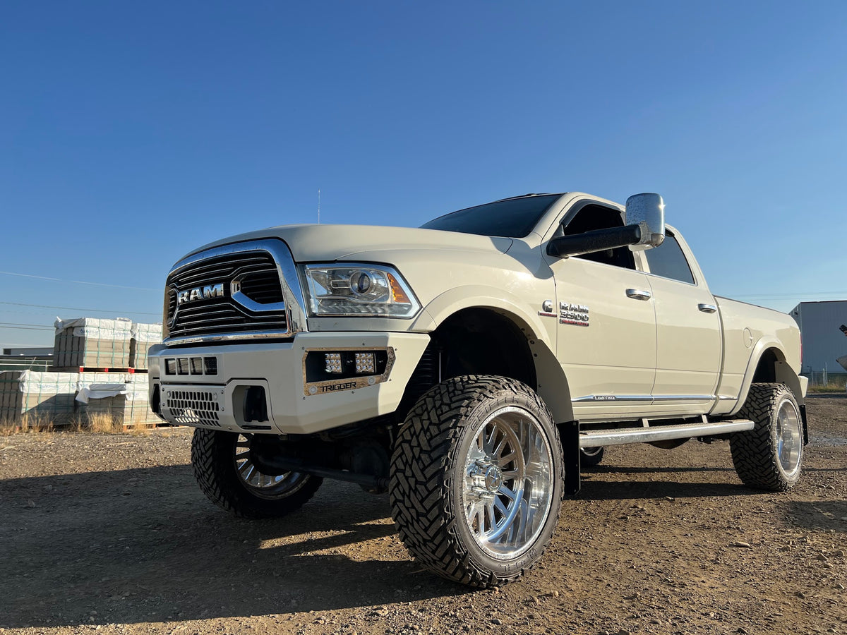 Maverick front bumper on a 2010-2018 Ram HD, shown in a custom white colour (ships in black powder coat)