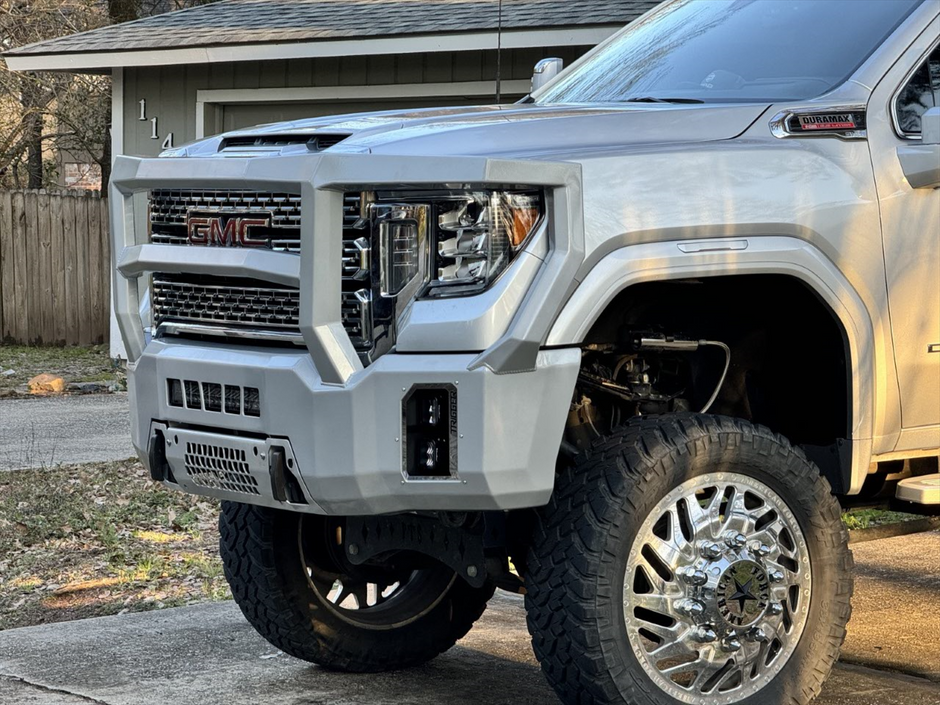 Maverick Grill Guard front bumper on a 2020-2023 GMC Sierra HD, shown in a custom silver colour (ships in black powder coat)