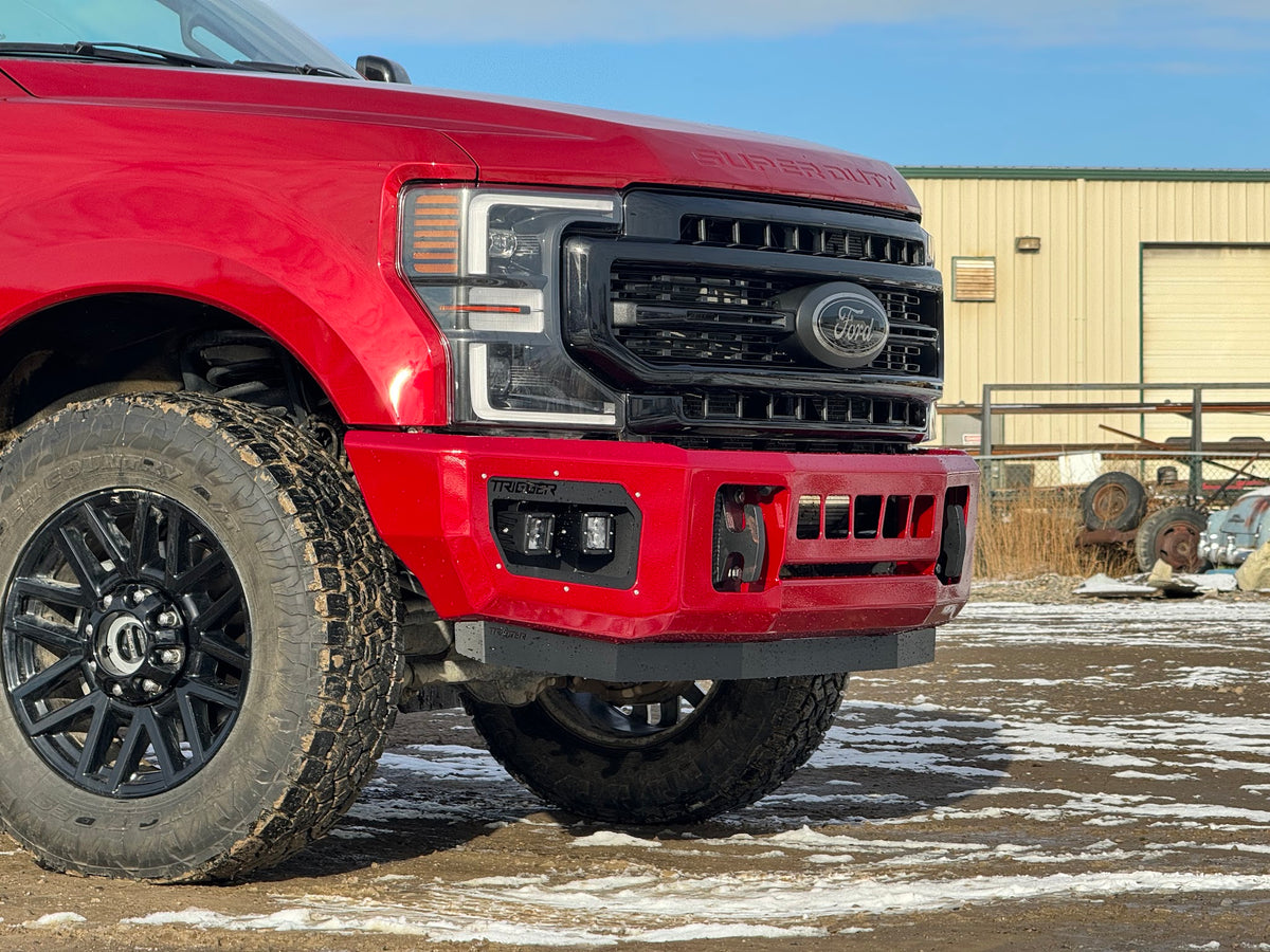 Maverick front base bumper on a 2017-2022 Ford Super Duty, shown in a custom red colour (ships in black powder coat)