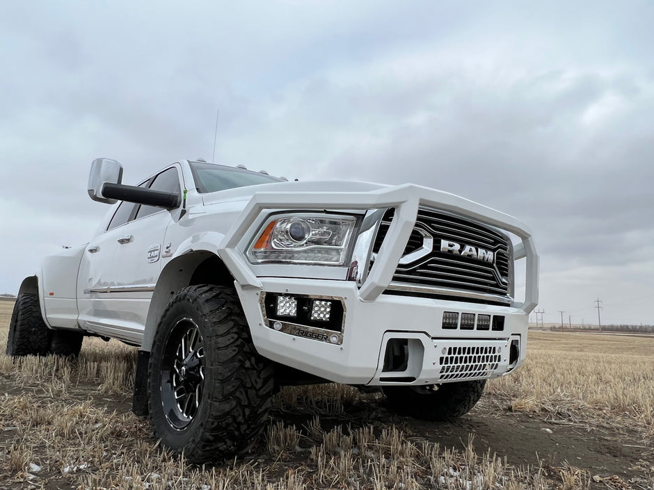 Maverick Grill Guard front bumper on a 2010-2018 Ram HD dually, shown in a custom white colour (ships in black powder coat)