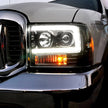 Ford Superduty 99-04 F250/F350/F450/F550 PROJECTOR HEADLIGHTS w/ Ultra High Power Smooth OLED HALOS & DRL - Clear / Chrome - Image 2