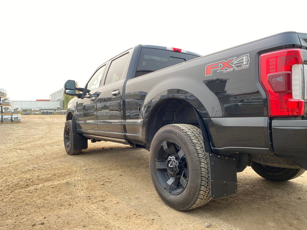 Gray Ford F-150 FX4 pickup truck on a dirt road