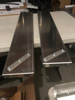 Product photo of the Rail Rack Accessory mount shelf in raw aluminum prior to painting or finishing.