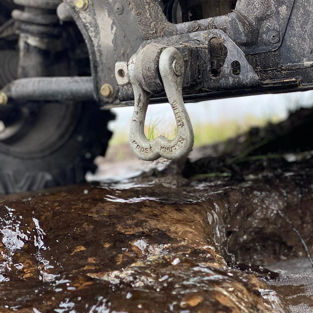 Dirty Galvanized Tow Shackle on the soft shackle hitch receiver of CanAm side by side SxS UTV